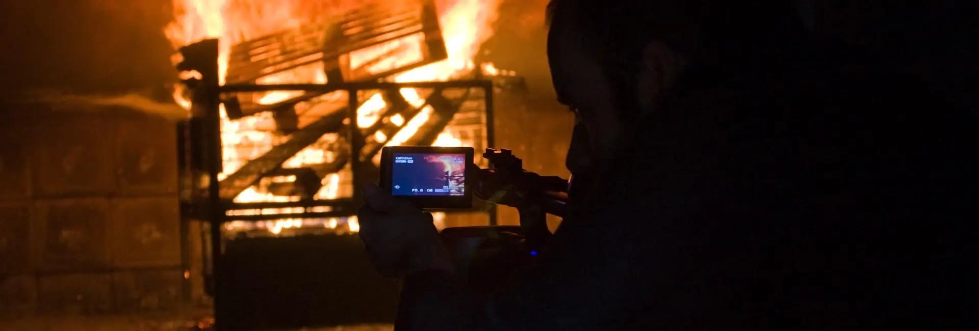 Deep focus shot of cameraman filming fire training video in South Yorkshires state-of-the-art training facility